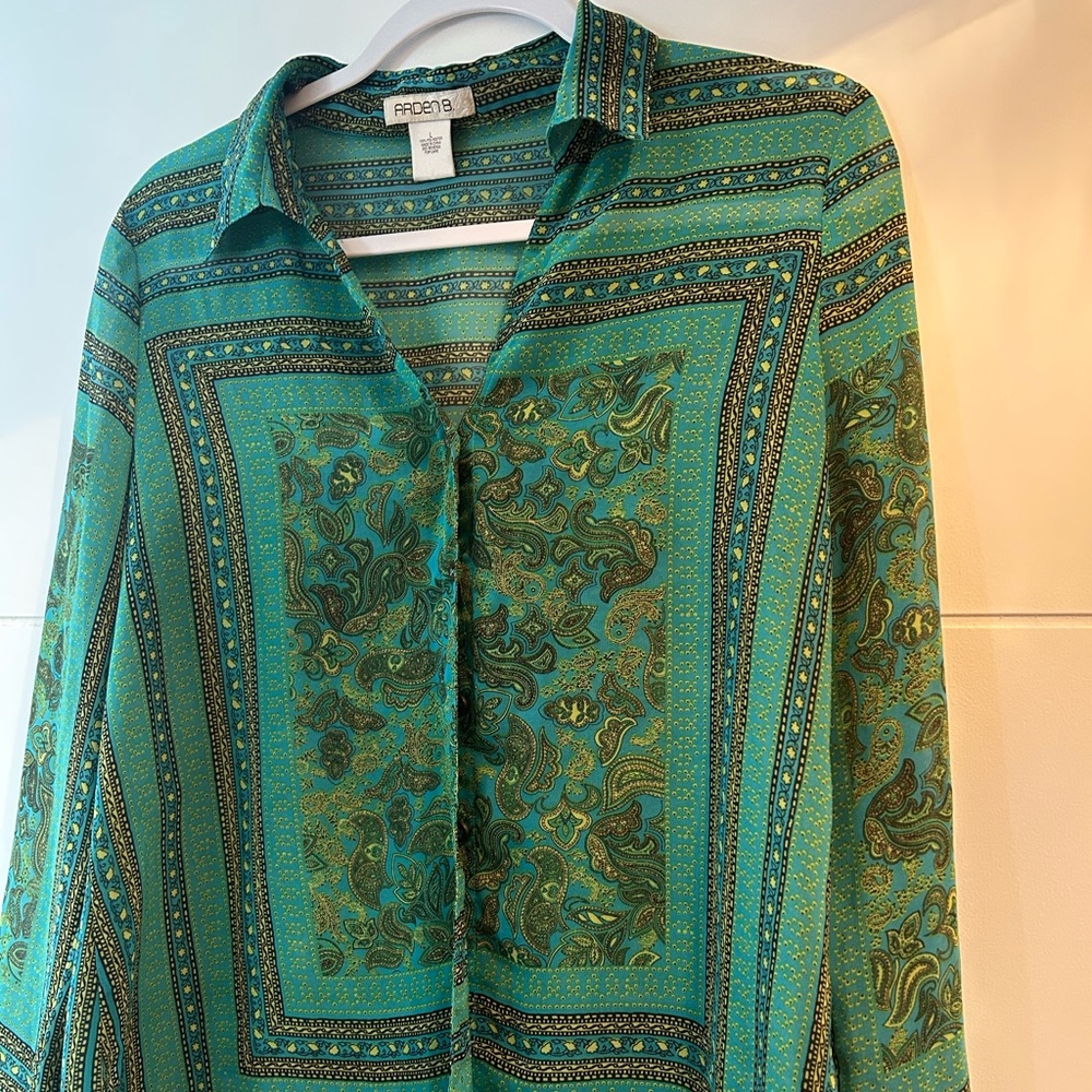 Sheer Arden B Women’s Blouse with sexy slits in arm.